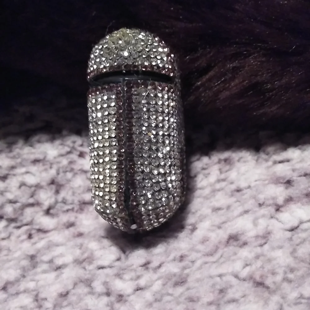 Crystal encased earbud case